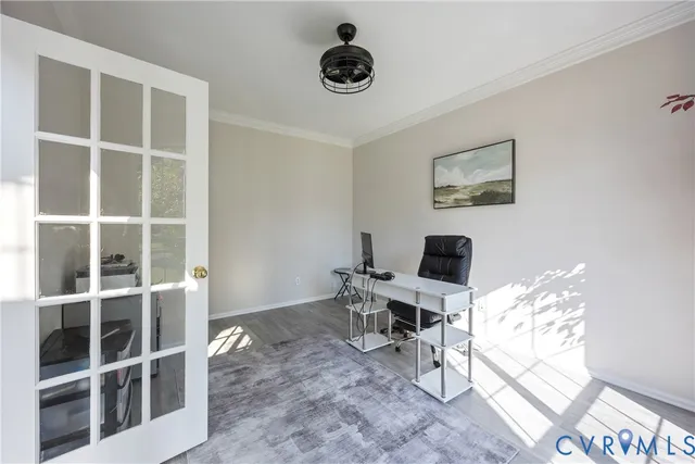 a workspace with furniture and window