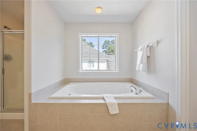 a view of a bathtub in a room