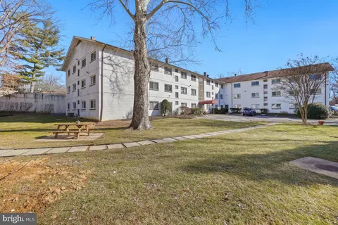 a view of an ocean with a swimming pool
