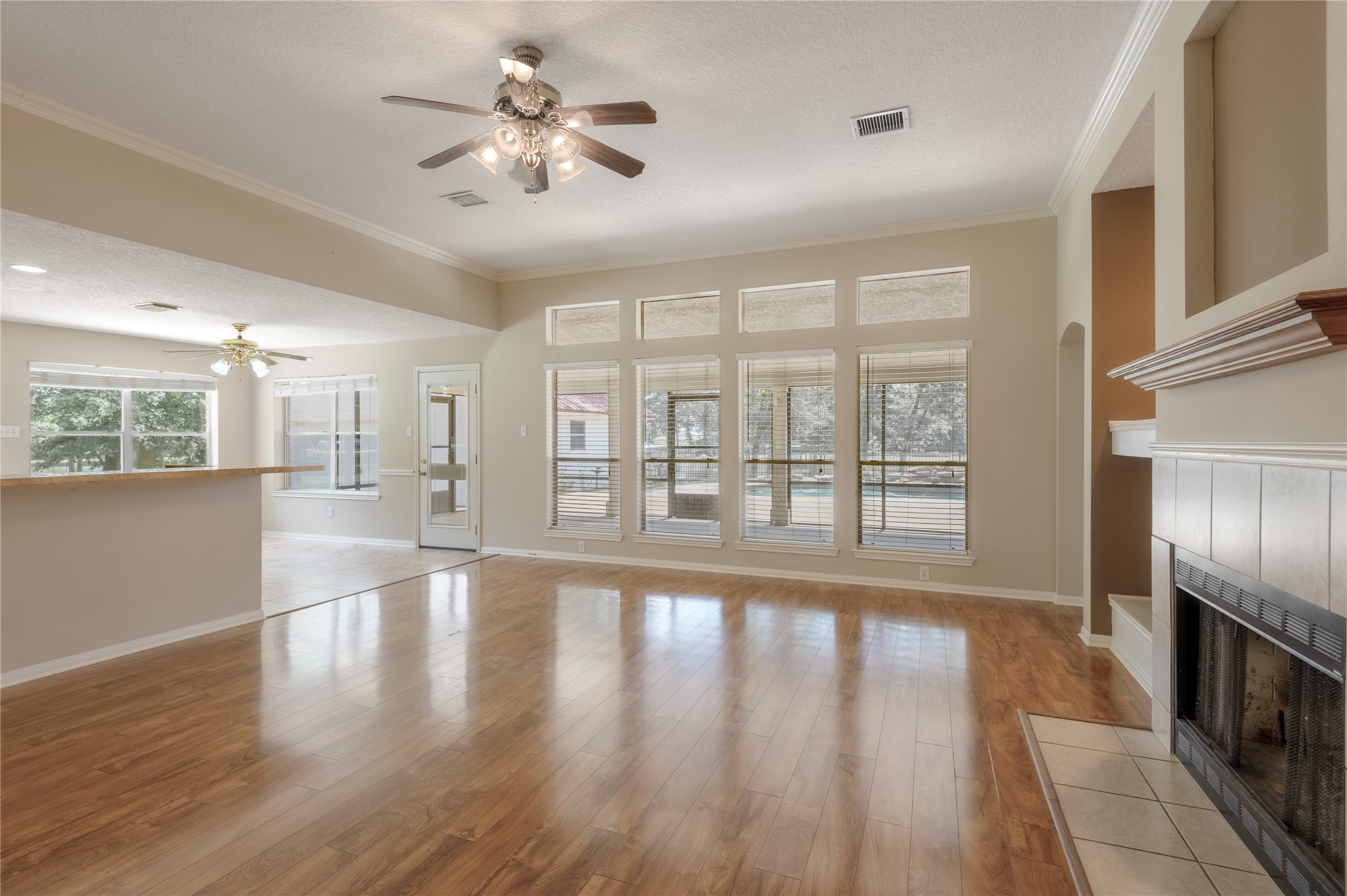 324 Red Oak Lane Trinity, TX 75862 - Photo 15 of 49 a view of an empty room with wooden floor and a window