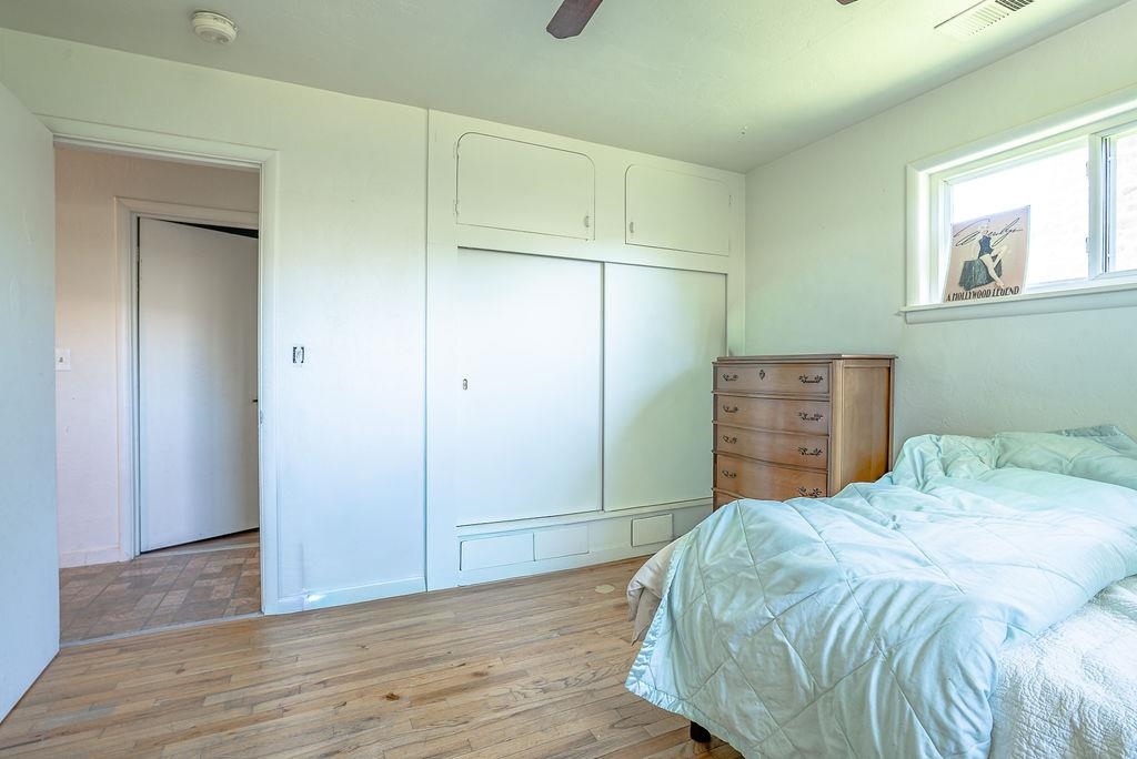 470 Riverside Avenue Chester, CA 96020 - Photo 17 of 25 a bedroom with a bed and a window