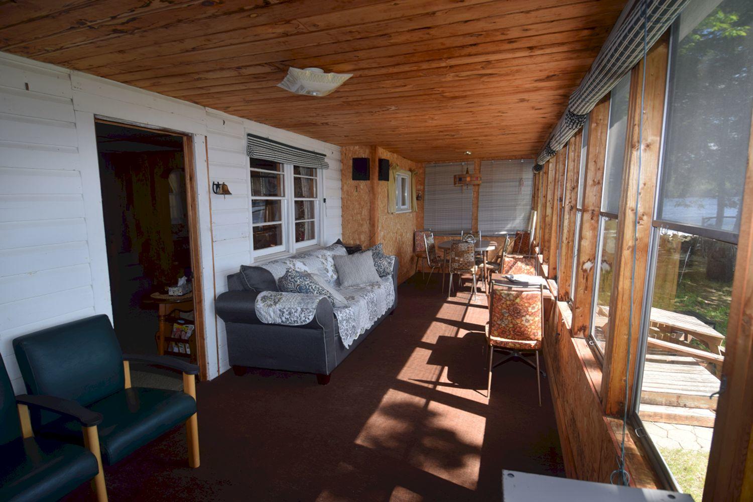 1405 Embden Pond Road Embden, ME 04958 - Photo 13 of 30 10. Full length front porch