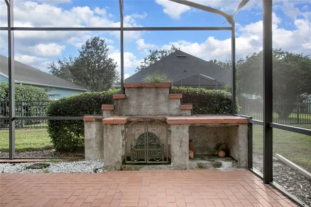 a view of a glass door and a window