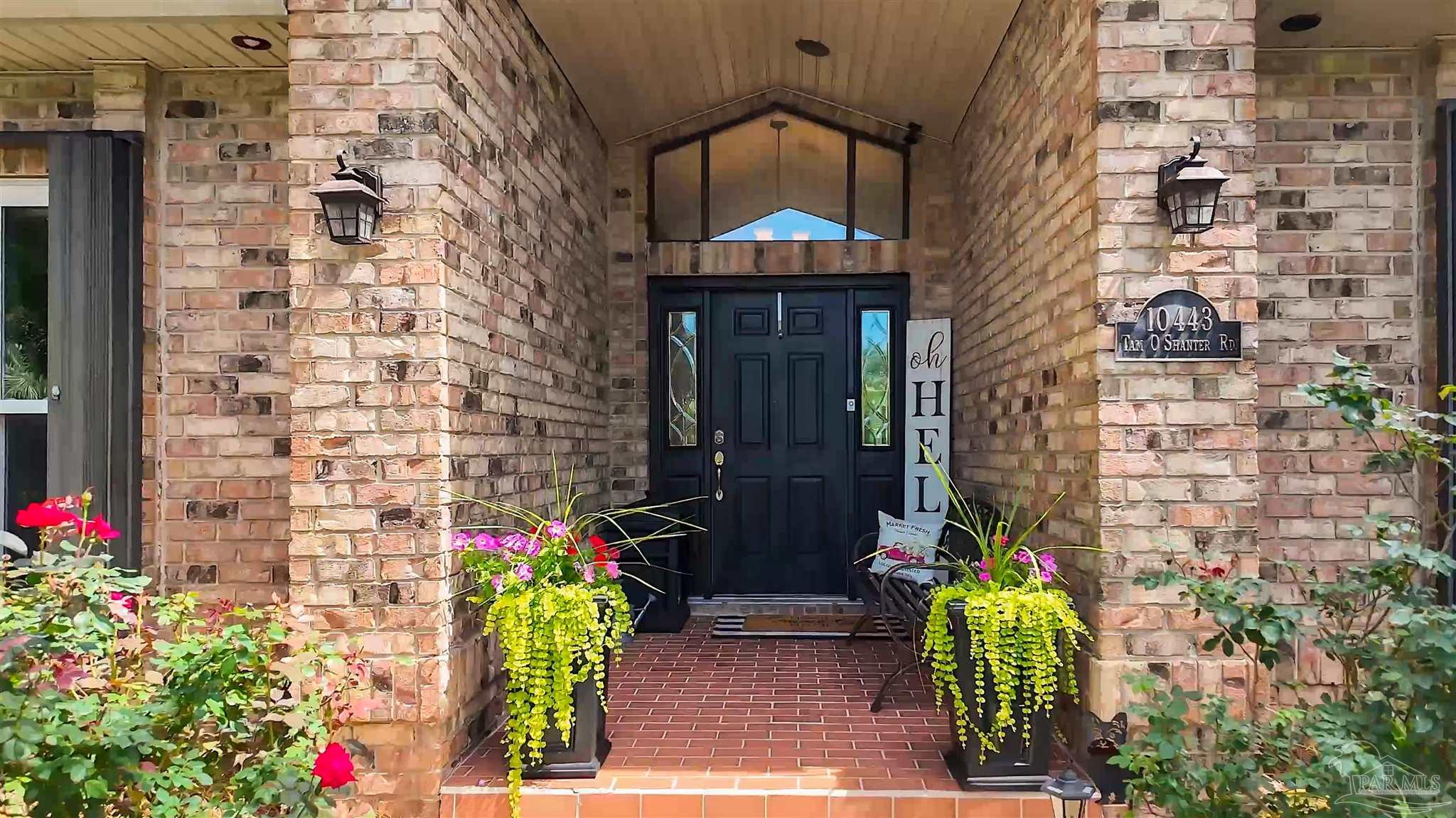 10443 Tam O Shanter Road Pensacola, FL 32514 - Photo 1 of 57 a front view of a house
