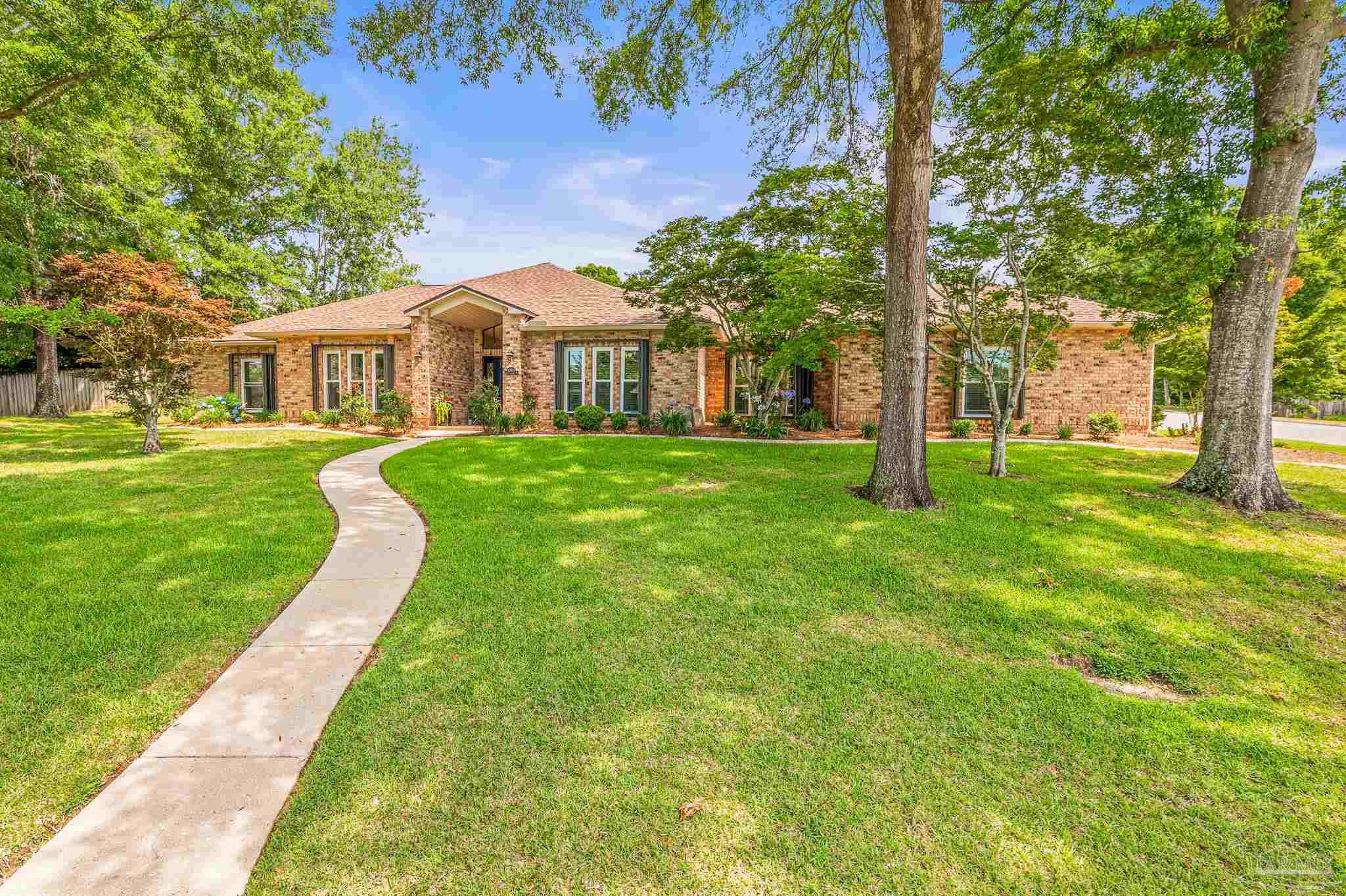 10443 Tam O Shanter Road Pensacola, FL 32514 - Photo 4 of 57 a view of a house with a yard