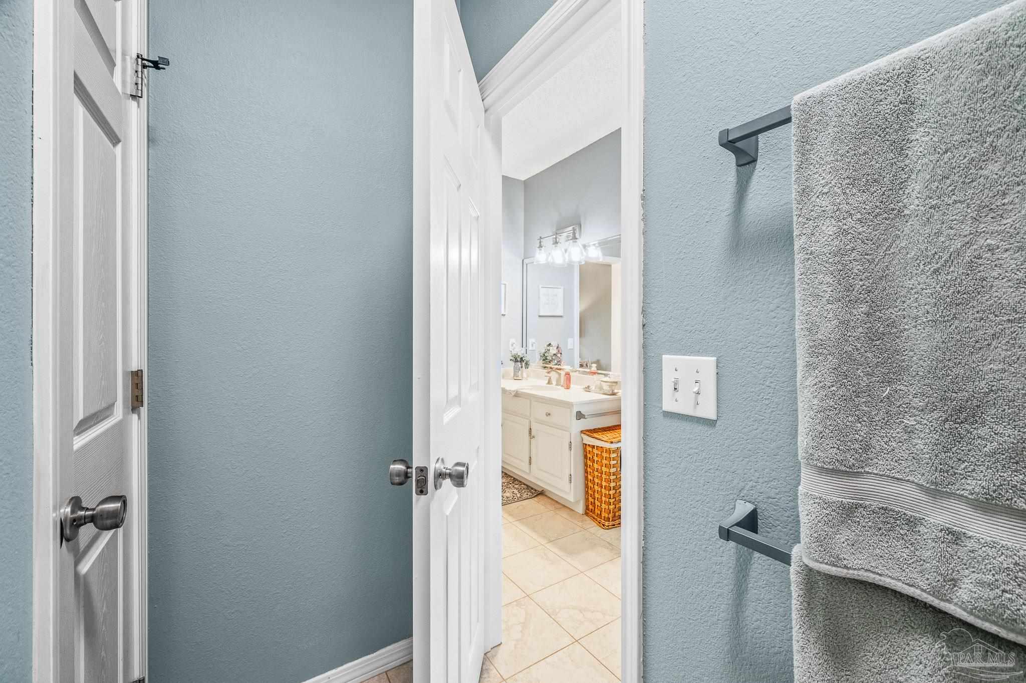 10443 Tam O Shanter Road Pensacola, FL 32514 - Photo 44 of 57 a bathroom with a granite countertop shower mirror and a sink
