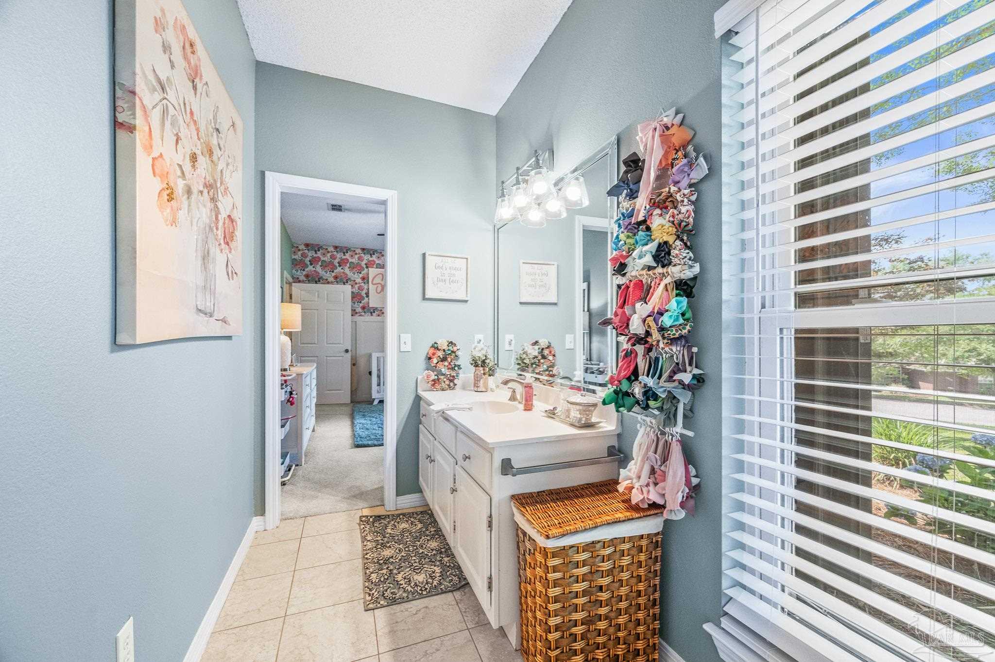 10443 Tam O Shanter Road Pensacola, FL 32514 - Photo 45 of 57 a room with furniture and a rug