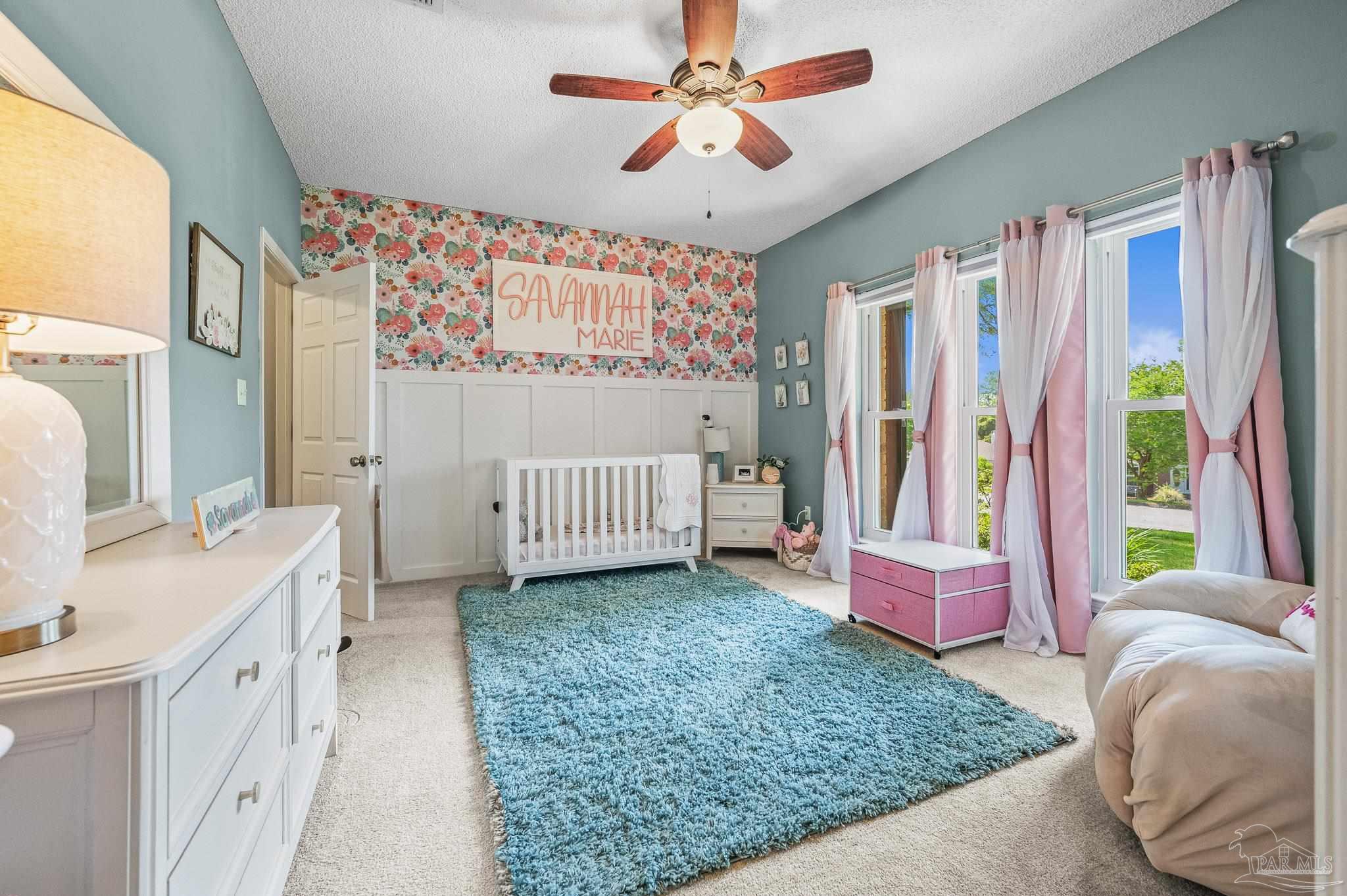 10443 Tam O Shanter Road Pensacola, FL 32514 - Photo 46 of 57 a bedroom with a bed and a window