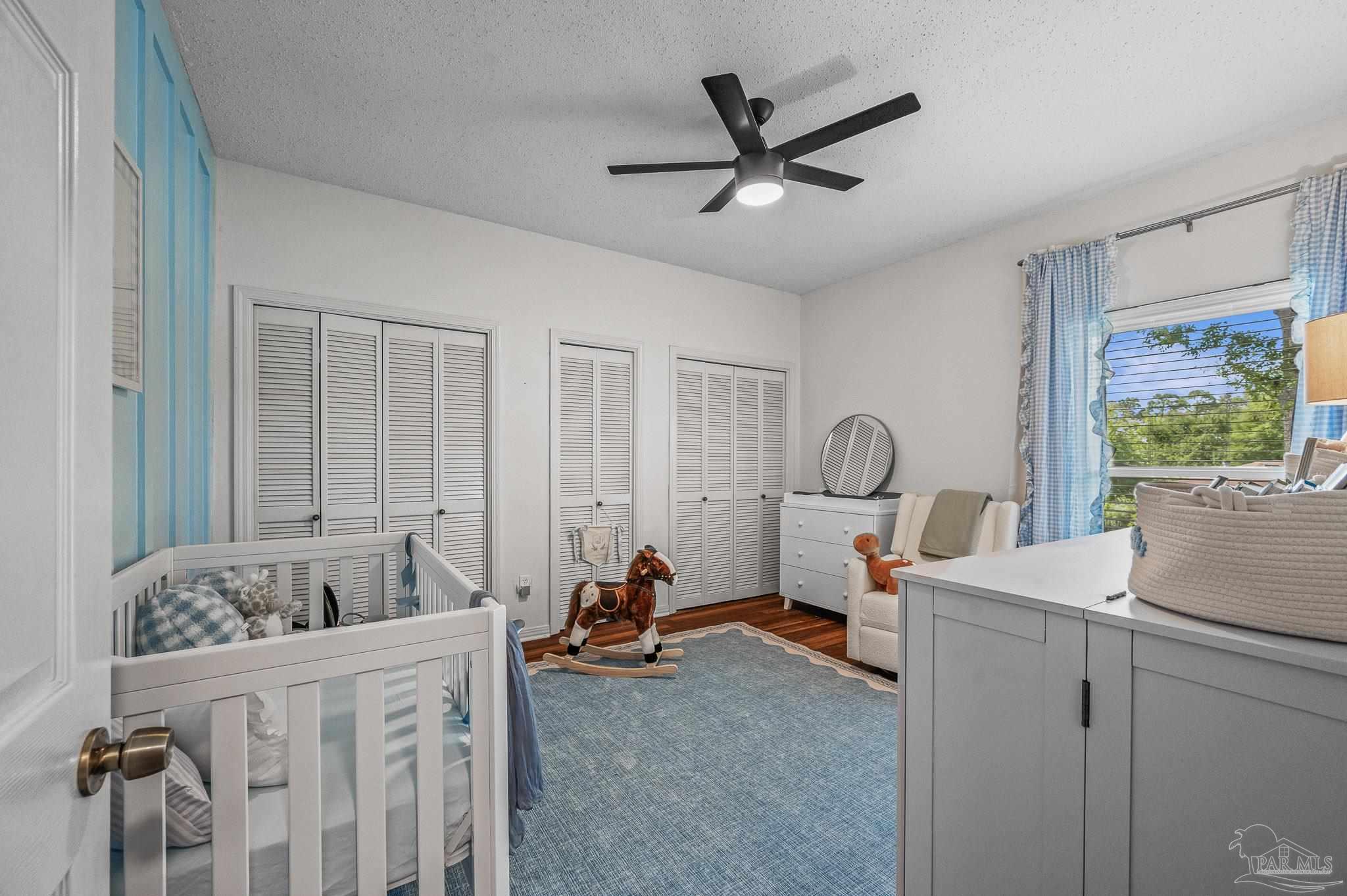 10443 Tam O Shanter Road Pensacola, FL 32514 - Photo 50 of 57 a bed room with furniture and a window