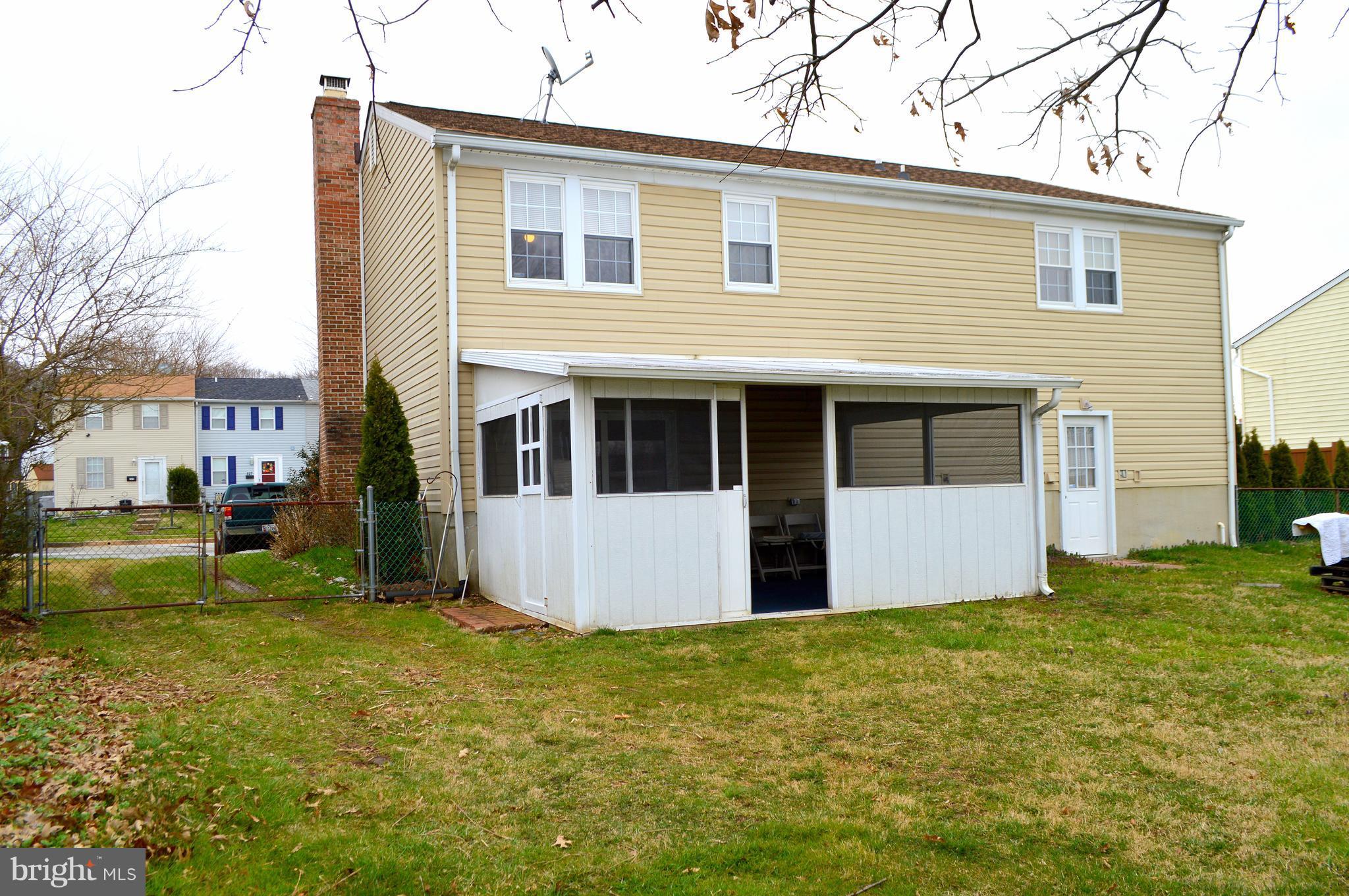 526 Holly Hunt Road Baltimore, MD 21220 - Photo 18 of 18 a view of a house with a yard