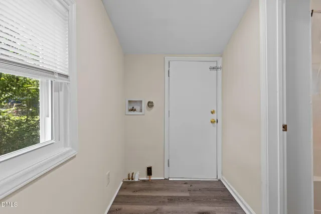 a bathroom with a toilet a sink and bathtub