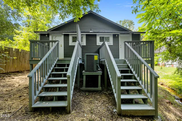 a view of a balcony with wooden floor