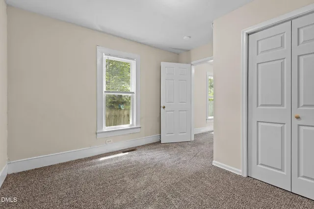 a kitchen with stainless steel appliances a stove and a microwave