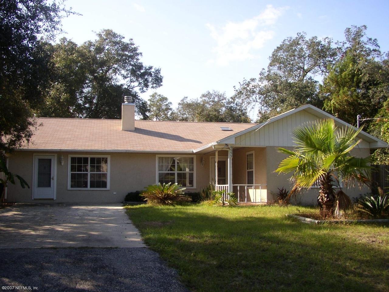 3333 Carmel Road St. Augustine, FL 32086 - Photo 1 of 12 a view of a house with backyard and sitting area