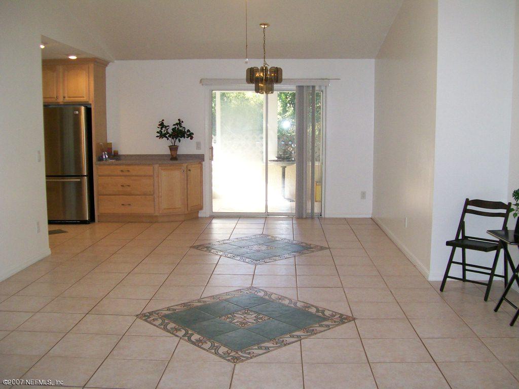 3333 Carmel Road St. Augustine, FL 32086 - Photo 4 of 12 a view of a kitchen with furniture and an empty room