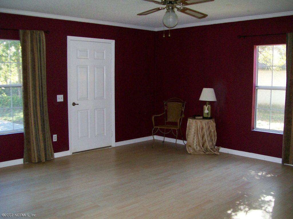 3333 Carmel Road St. Augustine, FL 32086 - Photo 7 of 12 a view of livingroom with furniture and chandelier fan