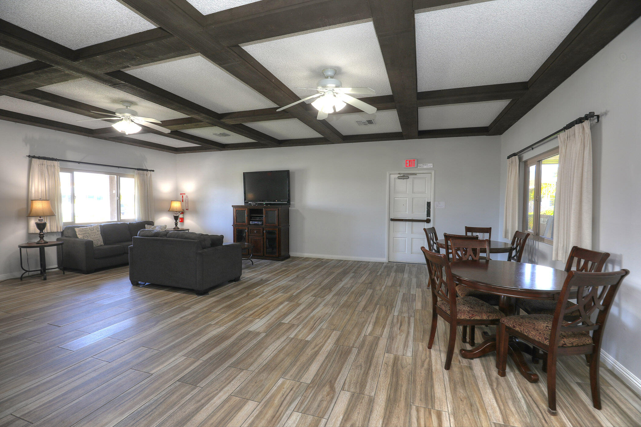 6180 Via Real, Unit 61 Carpinteria, CA 93013 - Photo 21 of 24 a view of a dining room with furniture window and wooden floor