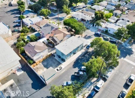an aerial view of residential house with outdoor space and street view