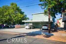 a view of a two chairs in the patio