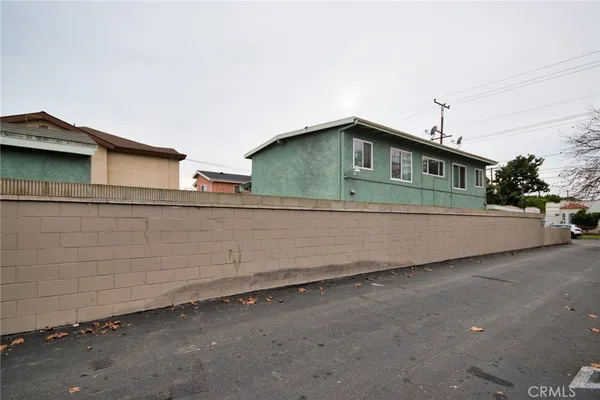 a front view of a house with garage