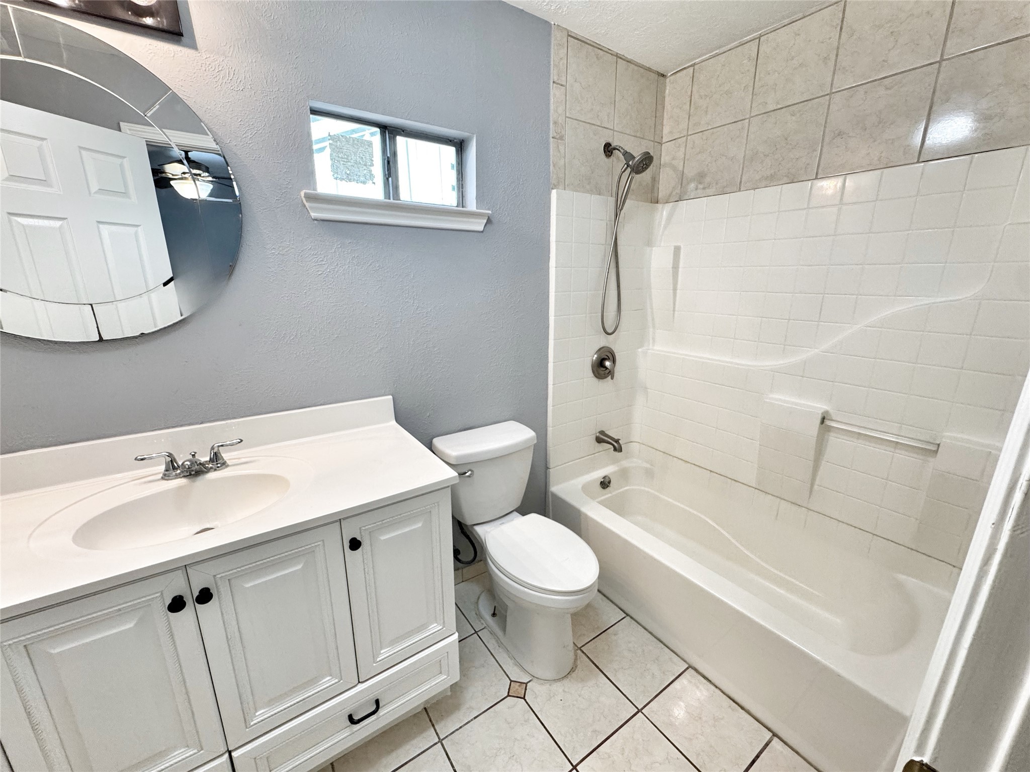 2633 Hollis Street Houston, TX 77093 - Photo 16 of 32 a bathroom with a sink toilet and shower