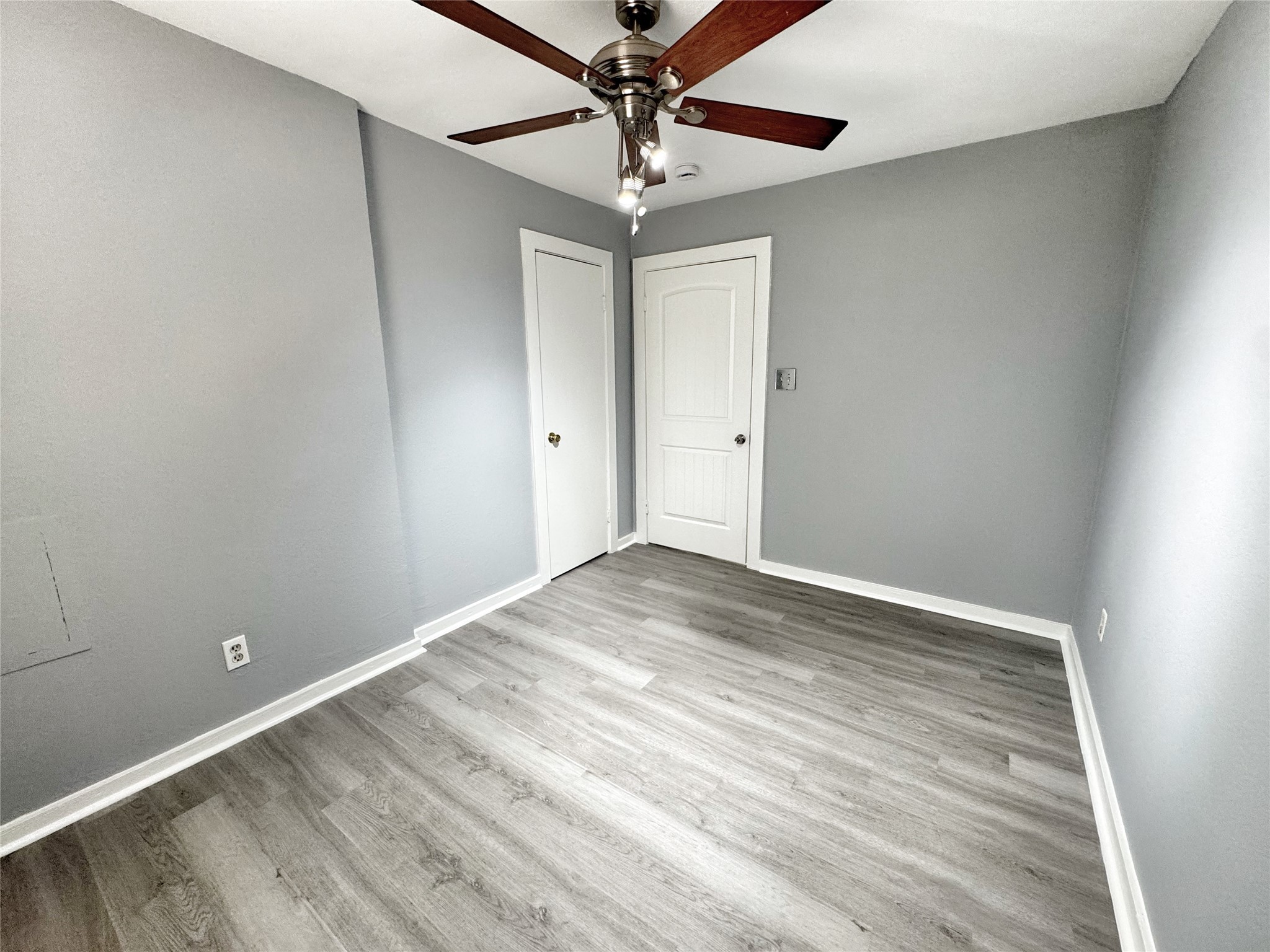 2633 Hollis Street Houston, TX 77093 - Photo 21 of 32 a view of empty room with wooden floor