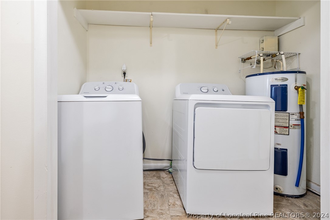 101 Dundee Lane Spring Lake, NC 28390 - Photo 13 of 32 a utility room with dryer and washer
