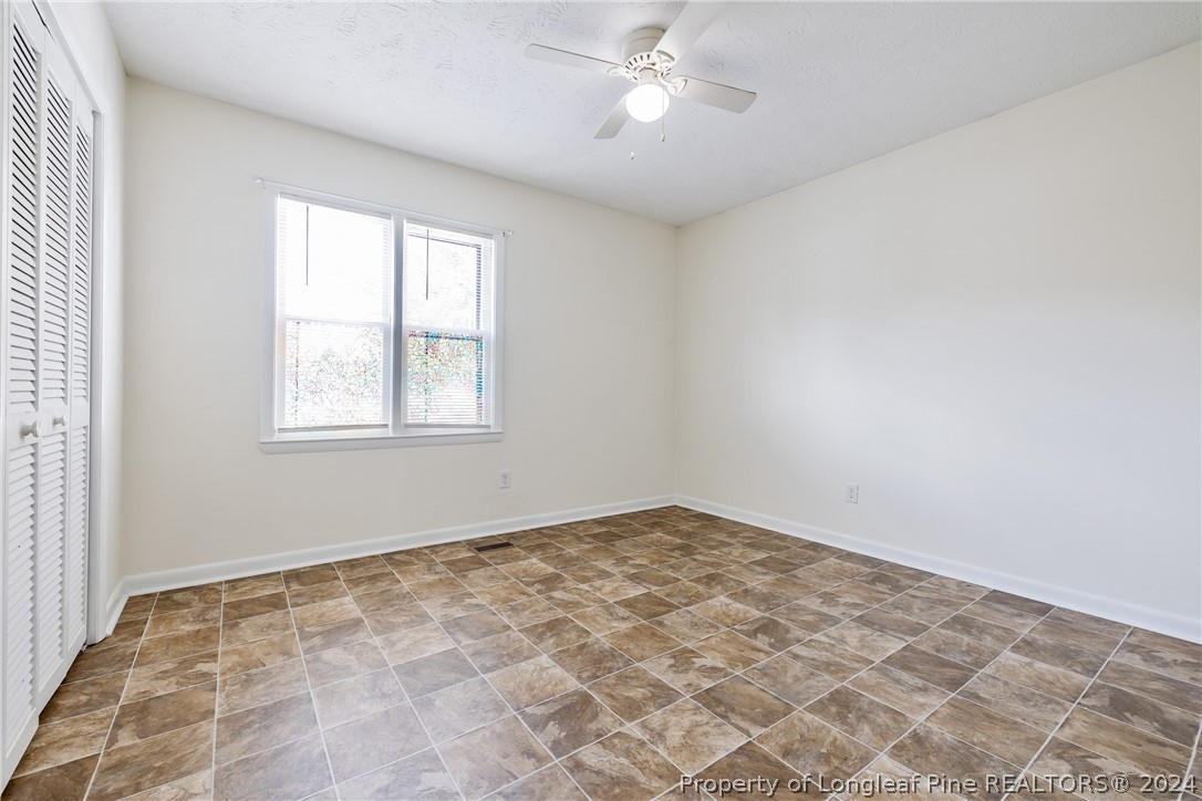 101 Dundee Lane Spring Lake, NC 28390 - Photo 16 of 32 a view of an empty room with a window