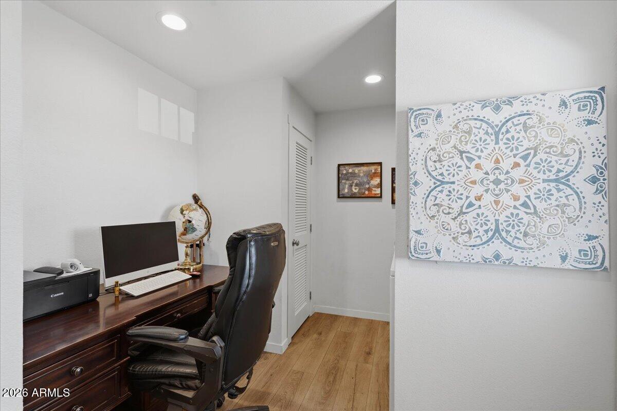 320 East McKellips Road, Unit 199 Mesa, AZ 85201 - Photo 23 of 32 a view of workspace with wooden floor windows