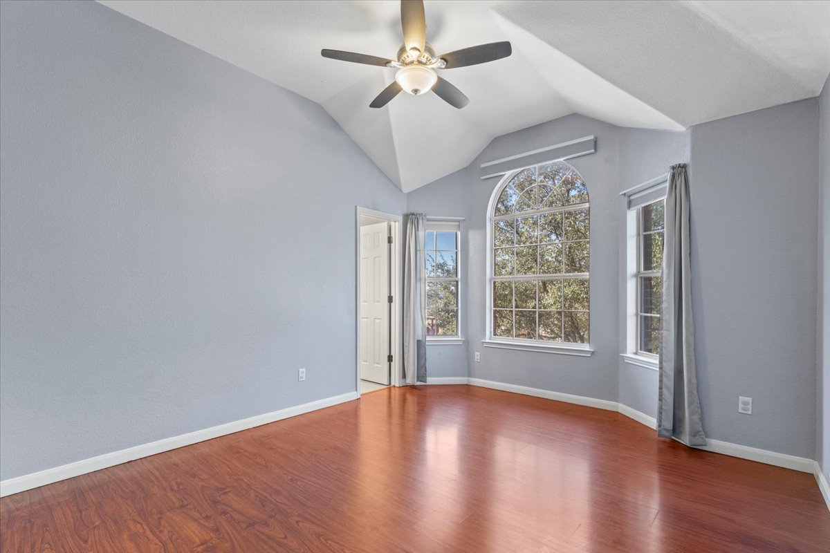 3523 Cheyenne Street Round Rock, TX 78665 - Photo 19 of 34 Unfurnished room with wood finished floors and ceiling fan