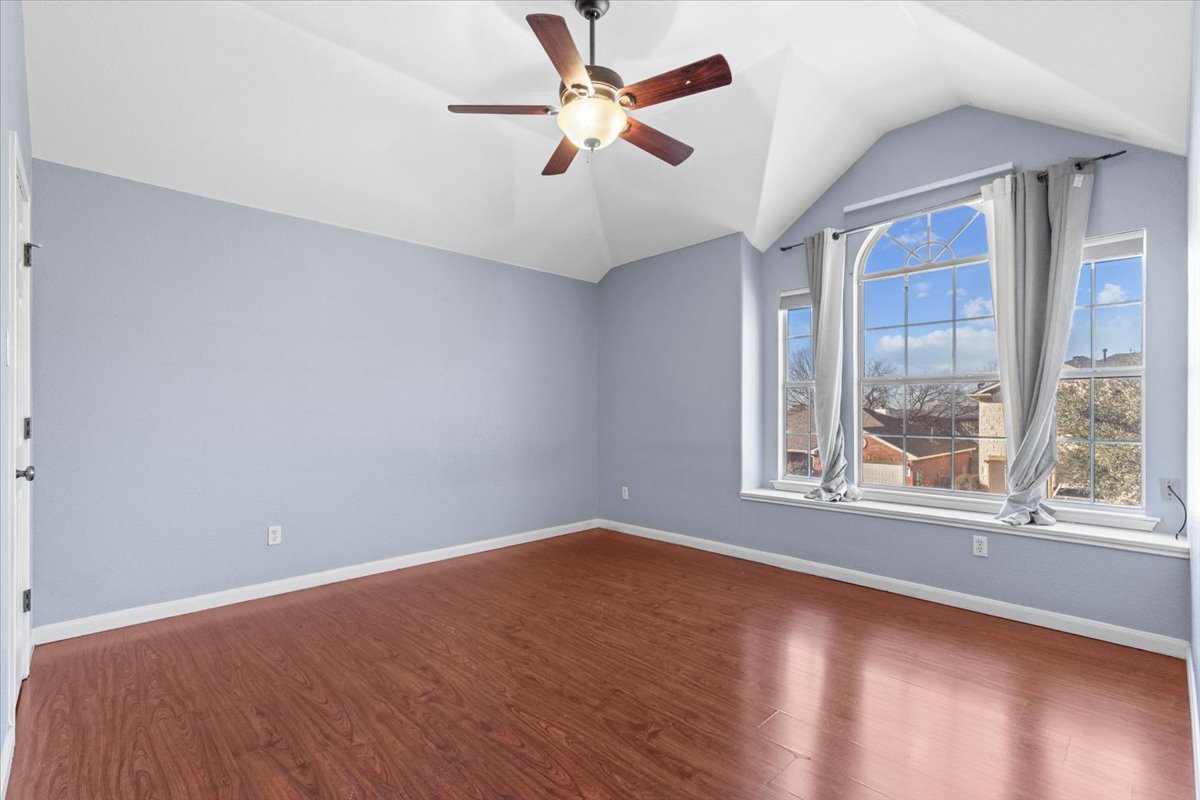3523 Cheyenne Street Round Rock, TX 78665 - Photo 22 of 34 Bonus room with wood finished floors and ceiling fan