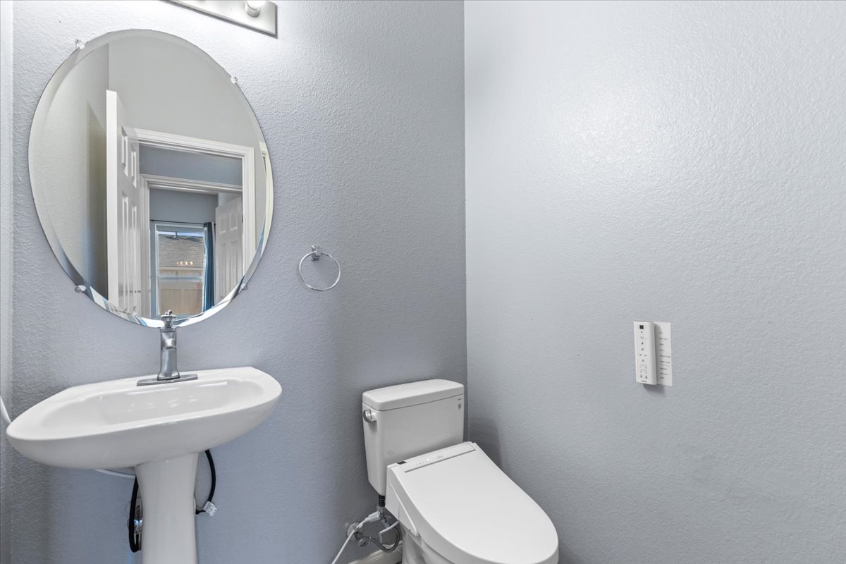 3523 Cheyenne Street Round Rock, TX 78665 - Photo 23 of 34 Half bathroom featuring toilet and a textured wall