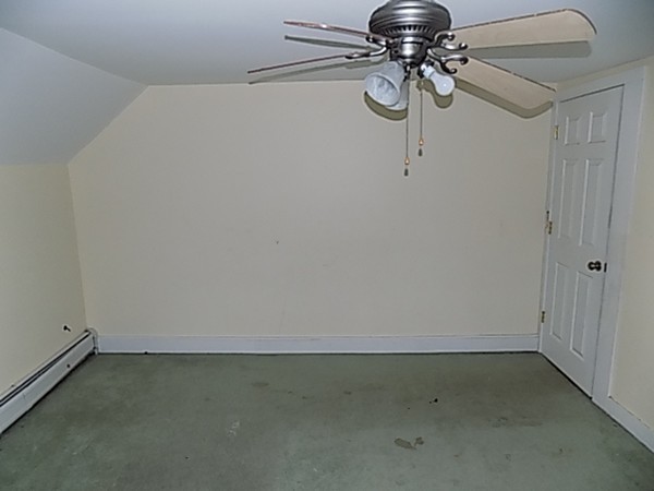 56 Fairview Avenue Chicopee, MA 01013 - Photo 14 of 22 a view of a room with racks on the wall