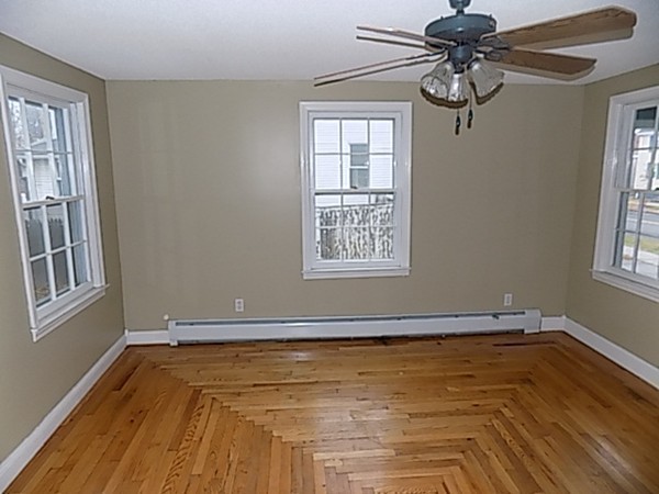 56 Fairview Avenue Chicopee, MA 01013 - Photo 18 of 22 a view of empty room with windows