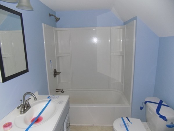 56 Fairview Avenue Chicopee, MA 01013 - Photo 19 of 22 a bathroom with a sink and a shower