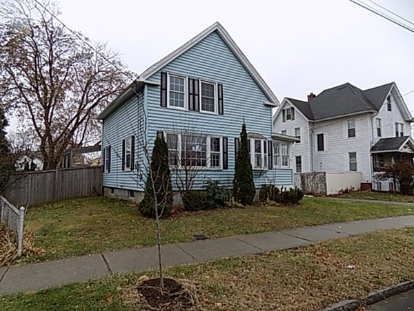 56 Fairview Avenue Chicopee, MA 01013 - Photo 2 of 22 a view of a yard in front view of a house