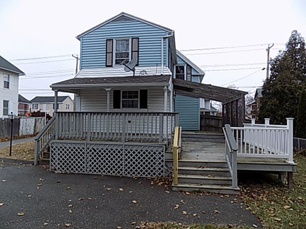 56 Fairview Avenue Chicopee, MA 01013 - Photo 4 of 22 a view of a house with a deck