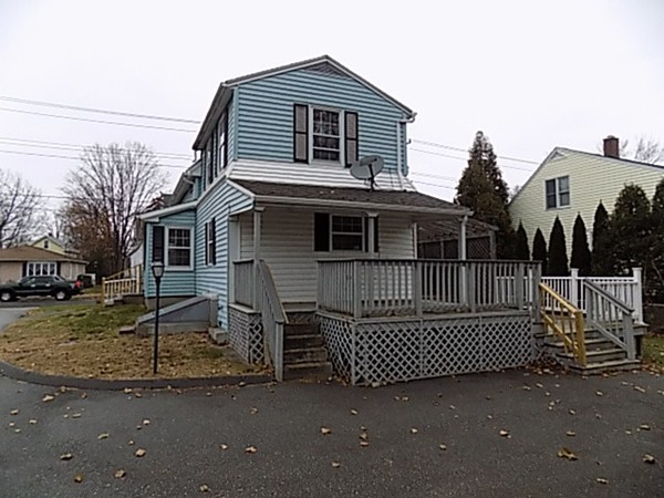 56 Fairview Avenue Chicopee, MA 01013 - Photo 5 of 22 a view of a house with a roof deck