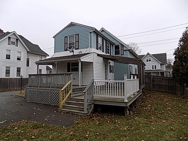 56 Fairview Avenue Chicopee, MA 01013 - Photo 6 of 22 a view of a house with a wooden deck
