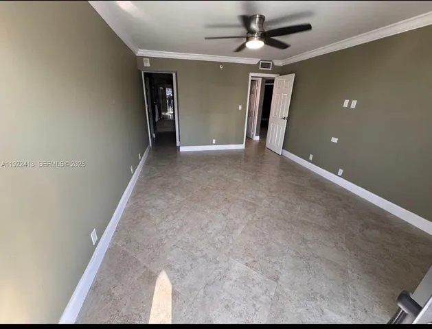 a room with pool table table and sofas