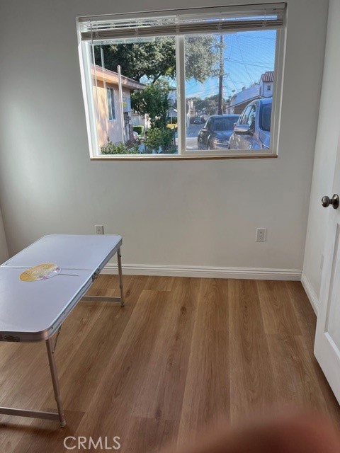 9659 Woodruff Avenue, Unit B Temple City, CA 91780 - Photo 2 of 8 a view of a room with wooden floor and window