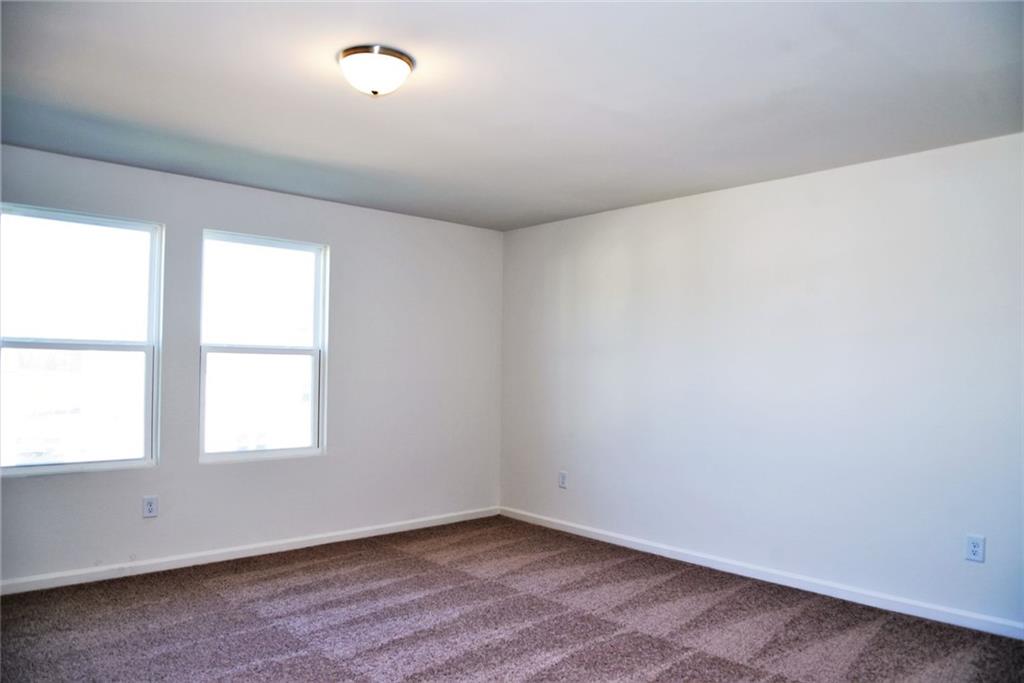 4374 Kendrick Circle Loganville, GA 30052 - Photo 19 of 25 an empty room with a window