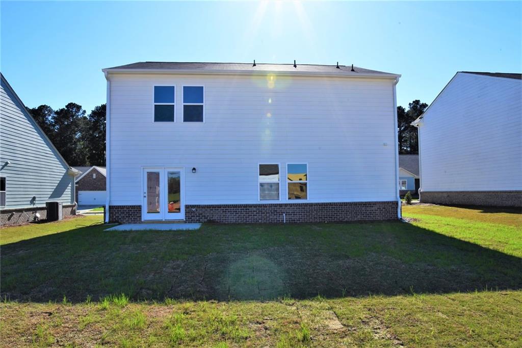 4374 Kendrick Circle Loganville, GA 30052 - Photo 24 of 25 a view of a house with a yard