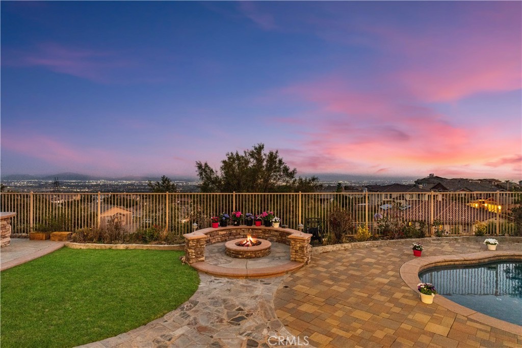 12617 Naples Way Rancho Cucamonga, CA 91739 - Photo 2 of 72 a view of a lake with a patio