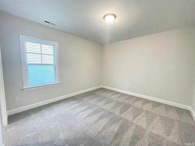 an empty room with an entryway