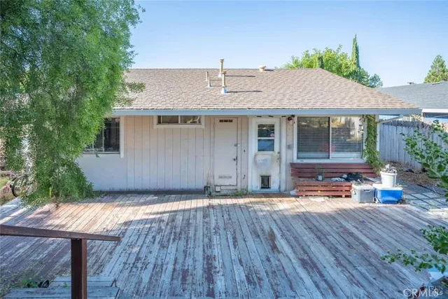 a backyard of a house with seating space