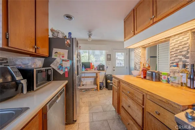 a room with sink furniture and a view of living room