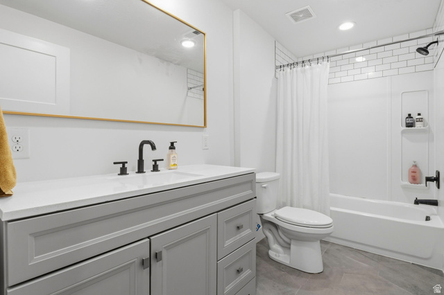 4150 Dover Lane Provo, UT 84604 - Photo 30 of 44 Contemporary bathroom featuring a light gray vanity with a white countertop and matte black fixtures