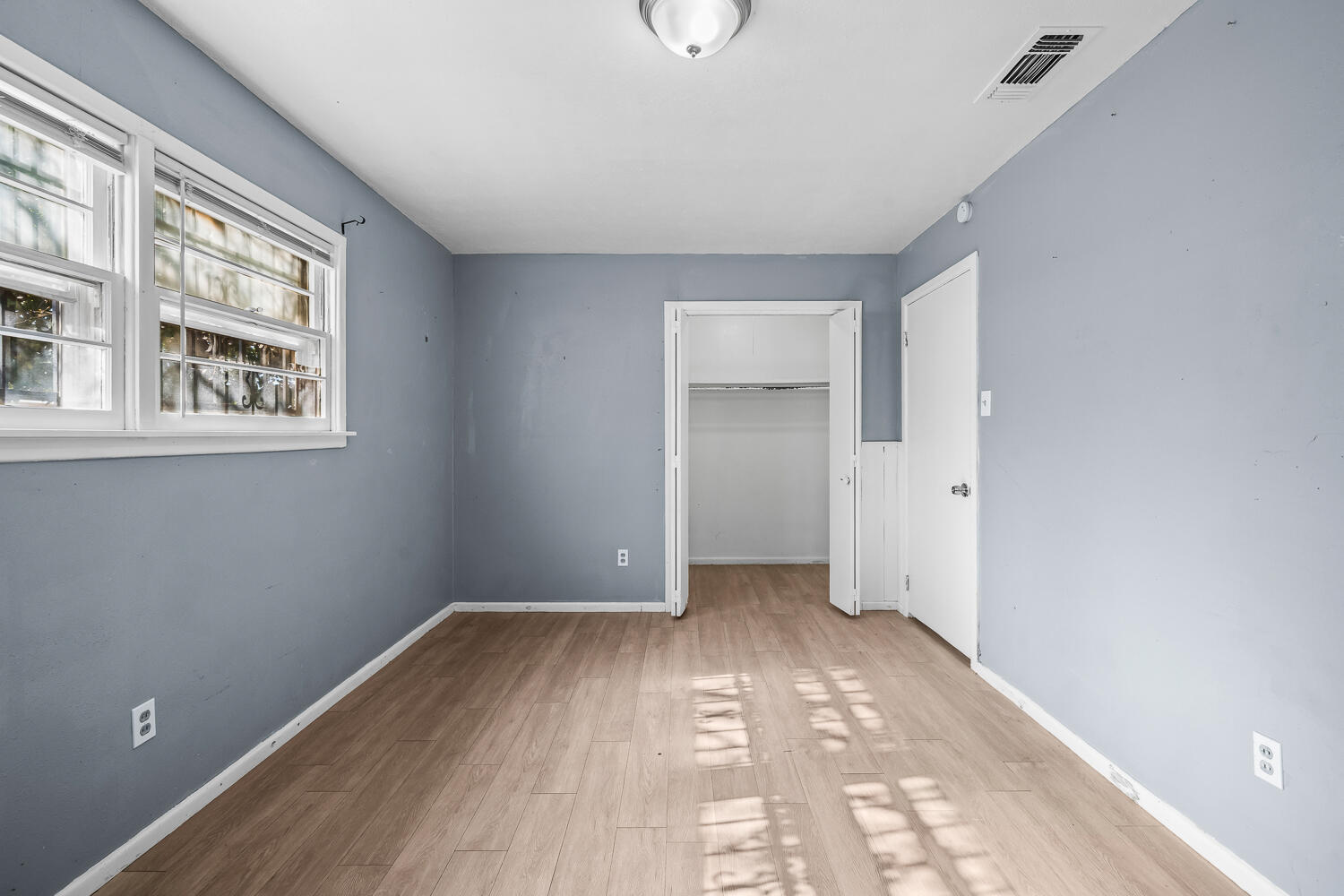 3409 East 17th Street Lubbock, TX 79403 - Photo 16 of 24 a view of an empty room with a window