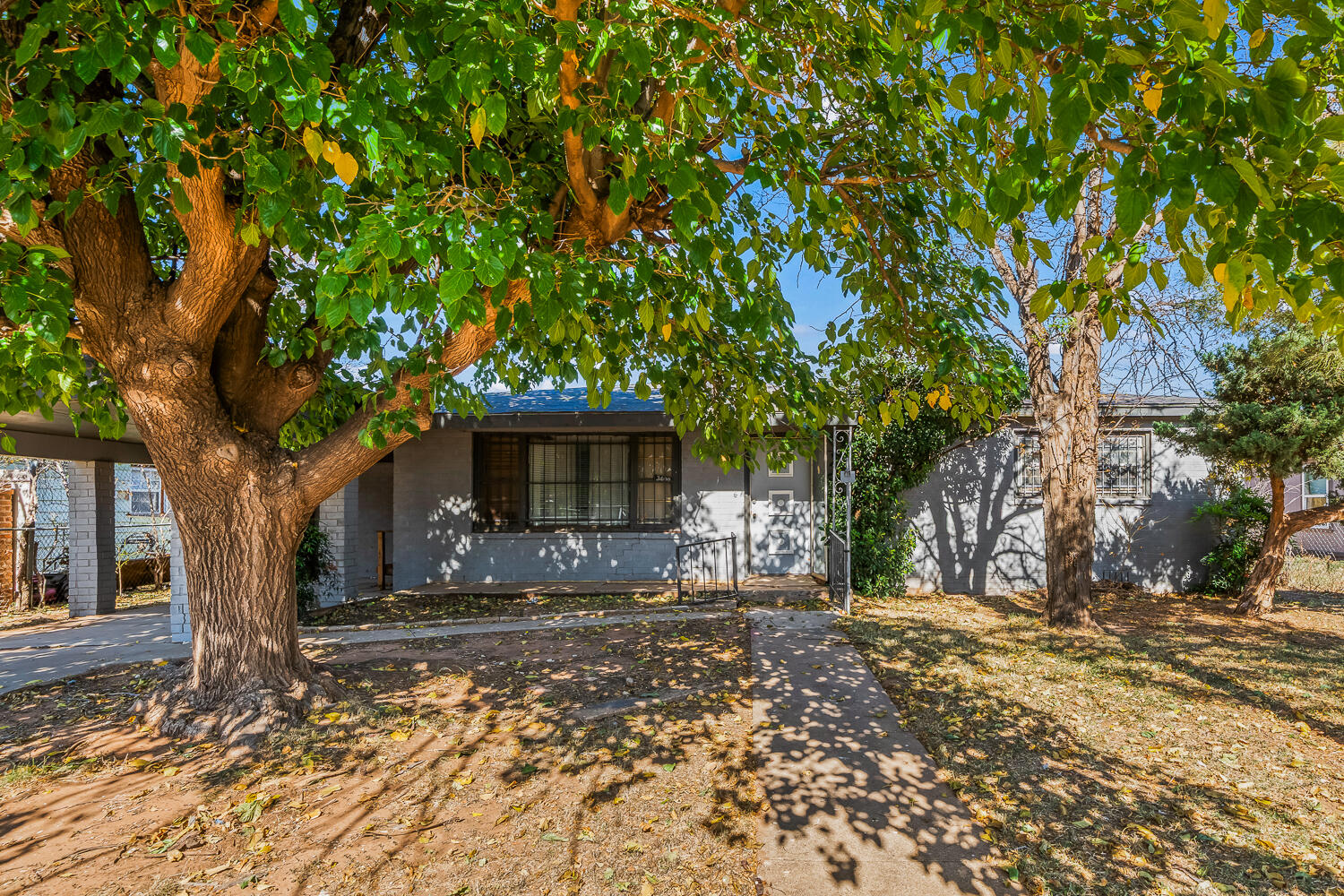 3409 East 17th Street Lubbock, TX 79403 - Photo 24 of 24 a front view of a house with a yard